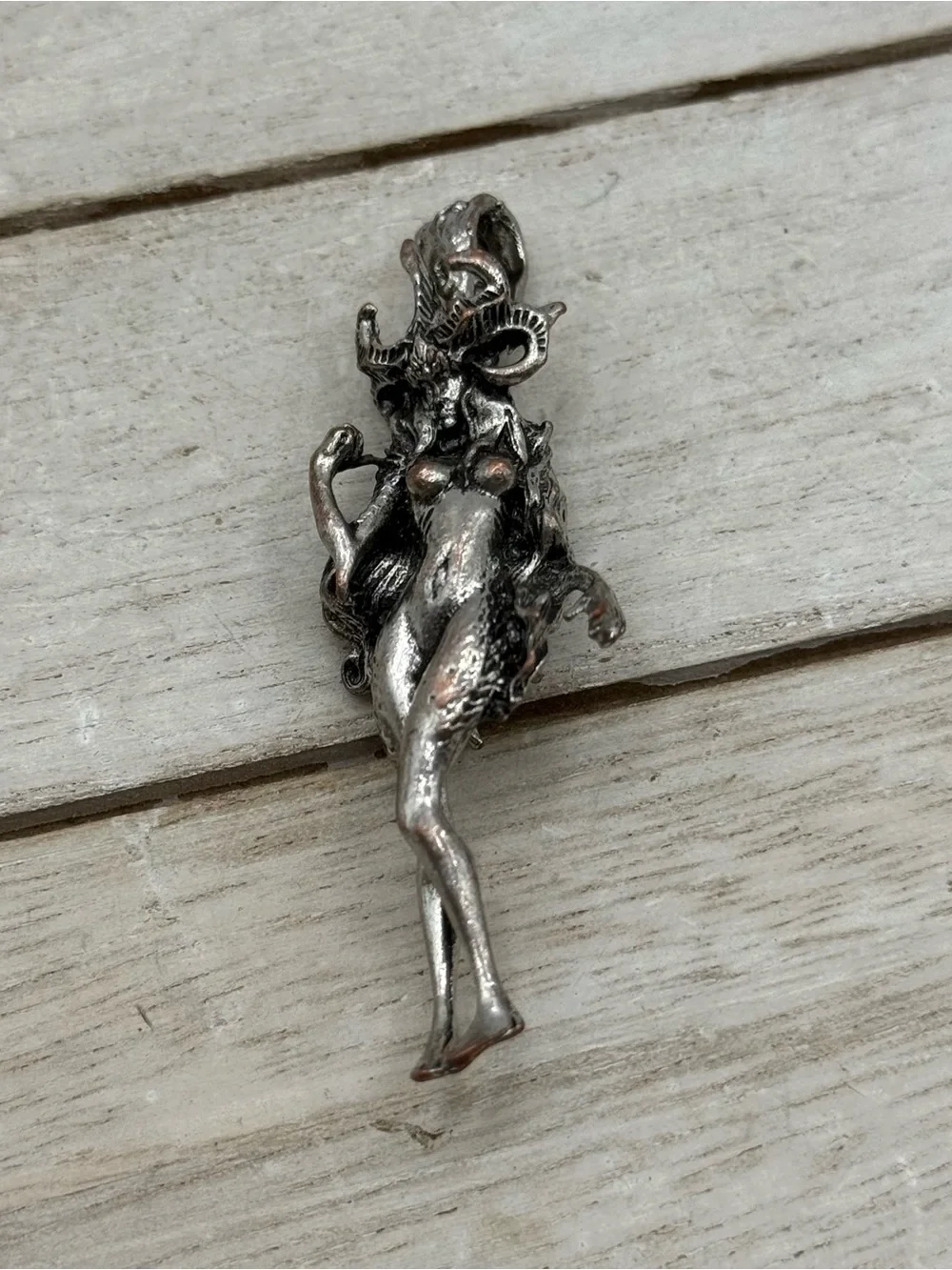 Silver-tone Mythical Creature Pendant Necklace Accent